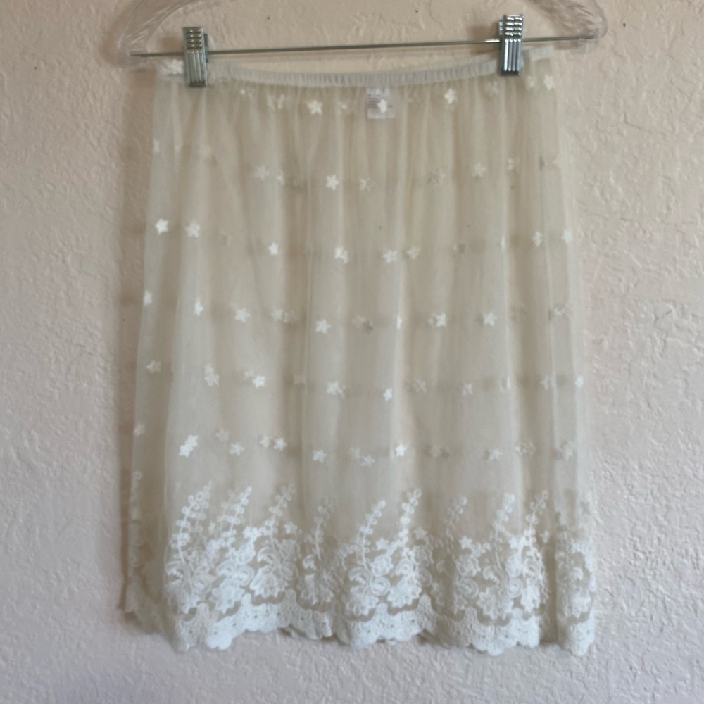 Super cute white shear skirt.